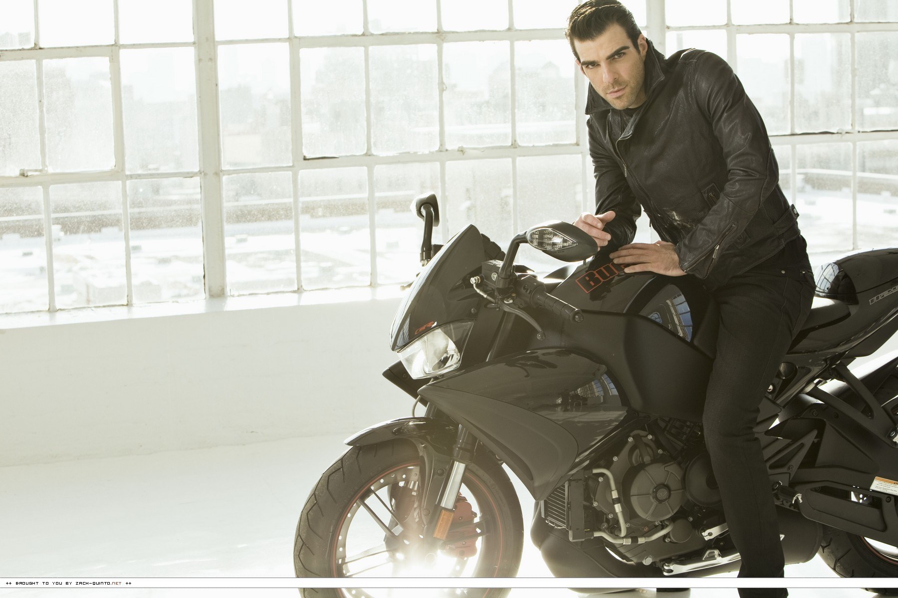 Man on a motorcycle in studio