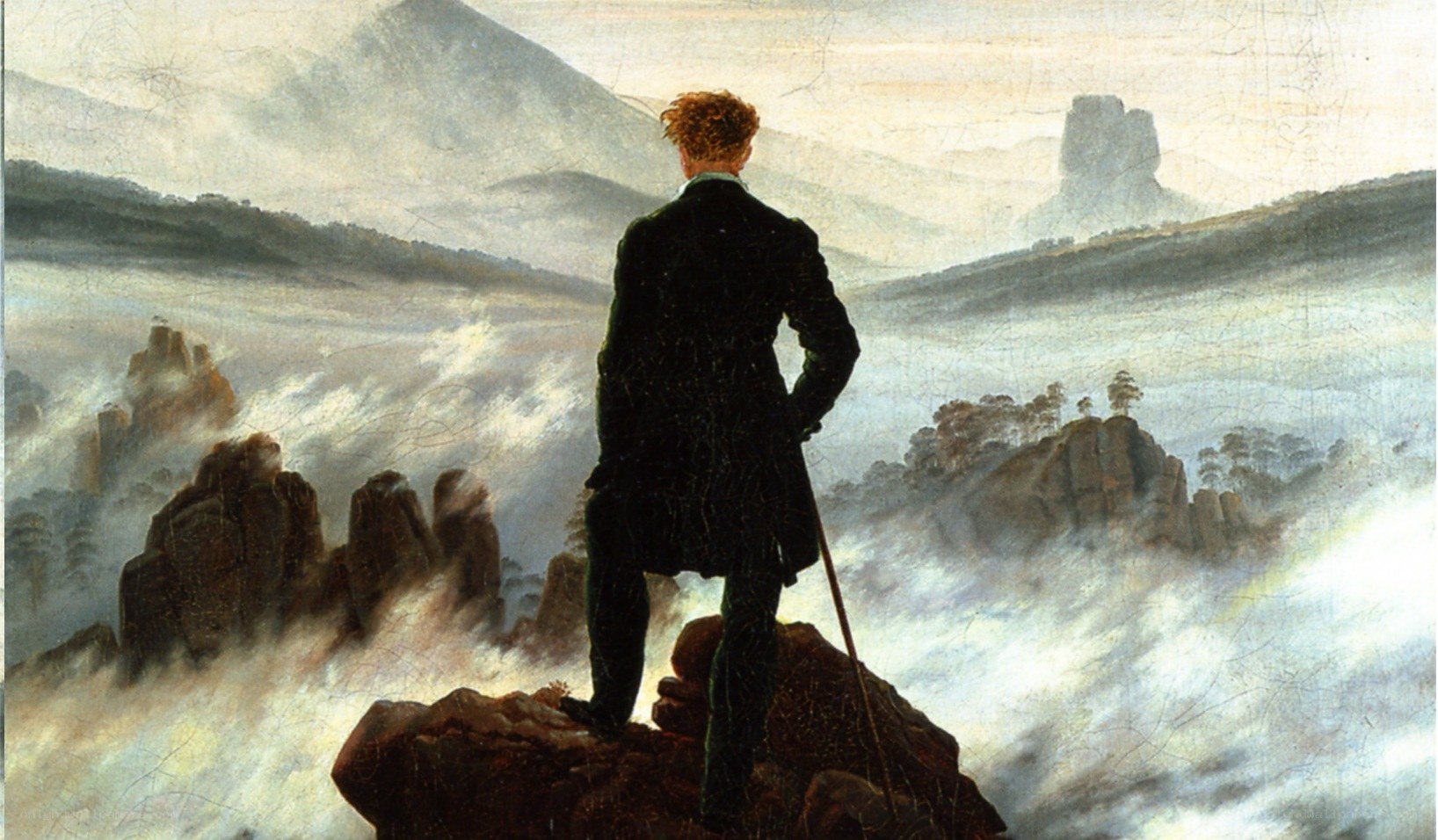Man on a mountain peak