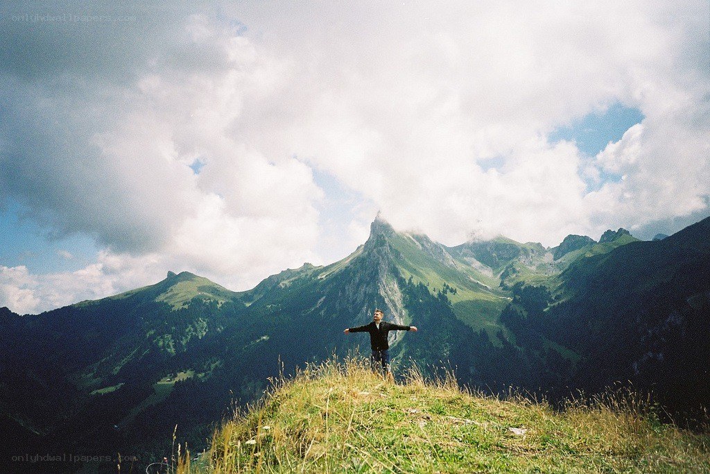 Man on a mountain summit