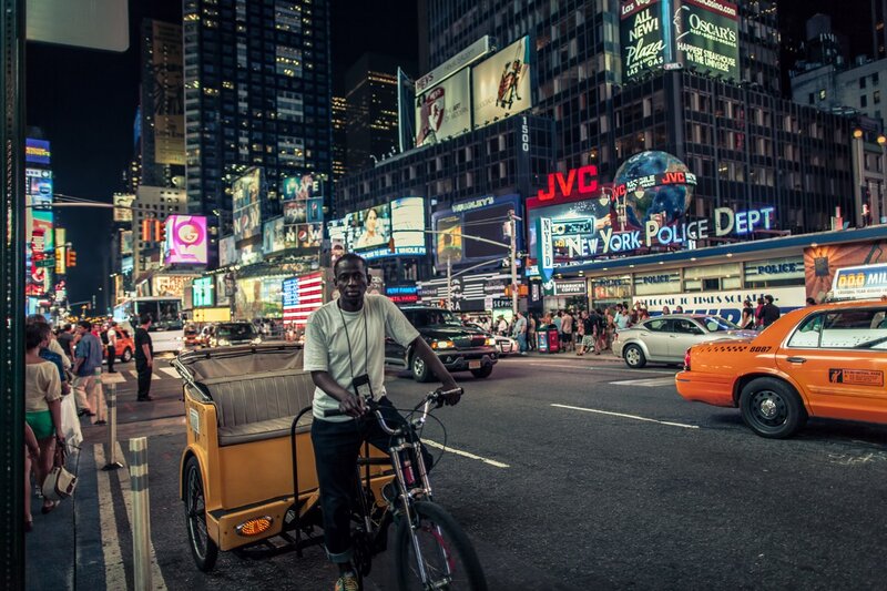 Man on a pedicab in Times Square