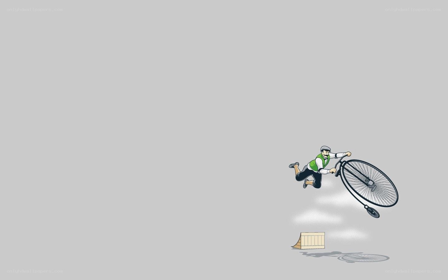 Man on a penny-farthing bicycle