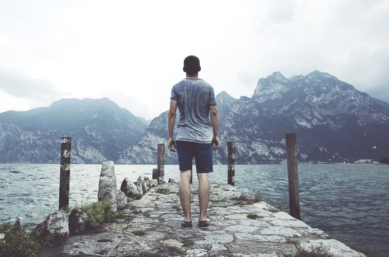 Man on a pier by the lake