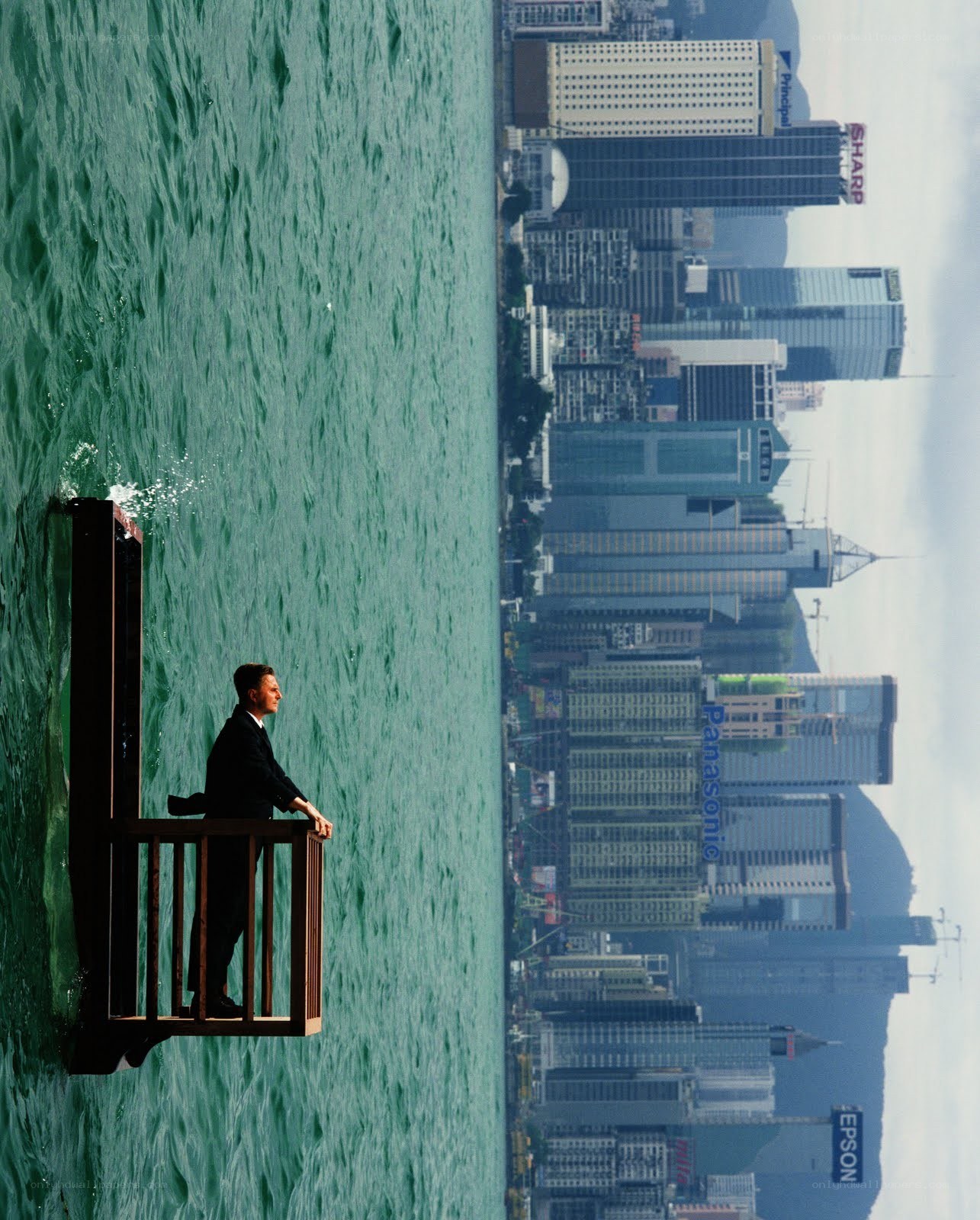Man on a platform in the water