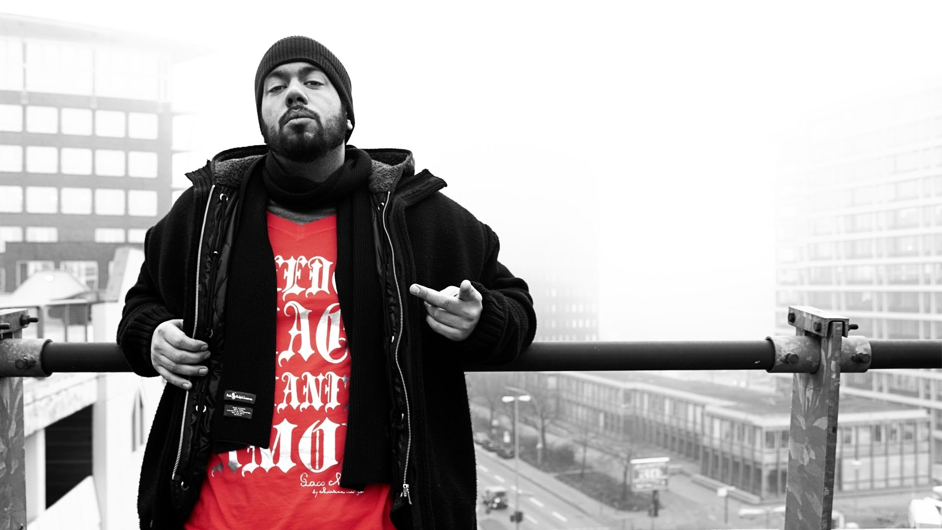man on a rooftop in the city
