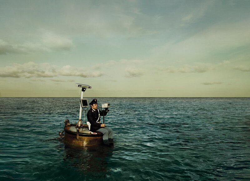 Man on a small boat at sea