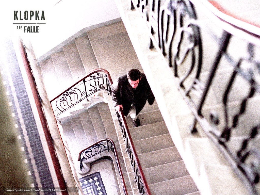 Man on a spiral staircase