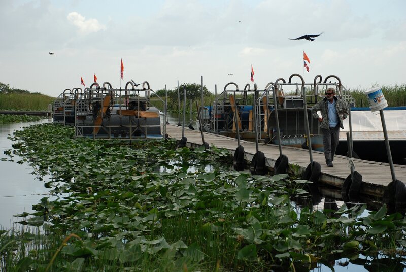 Man on Airboat Dock