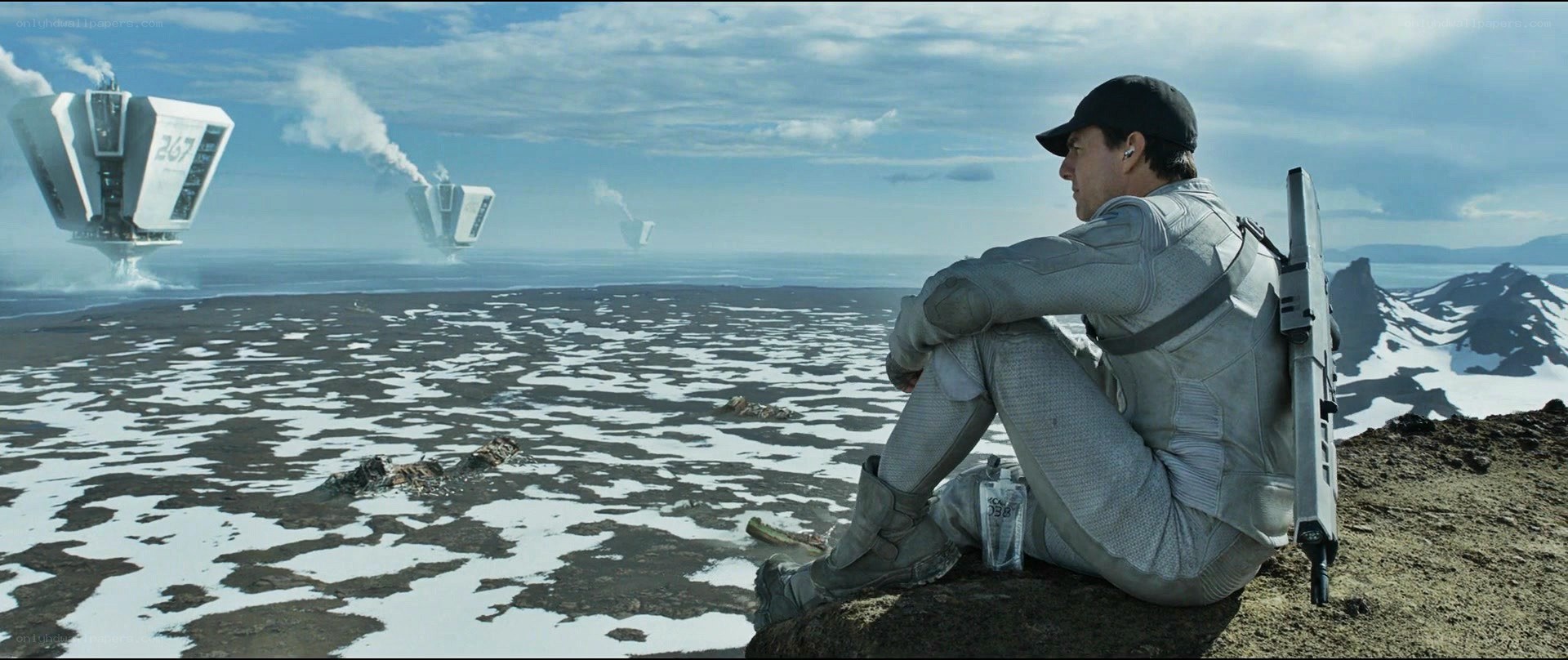 man on alien planet with ships