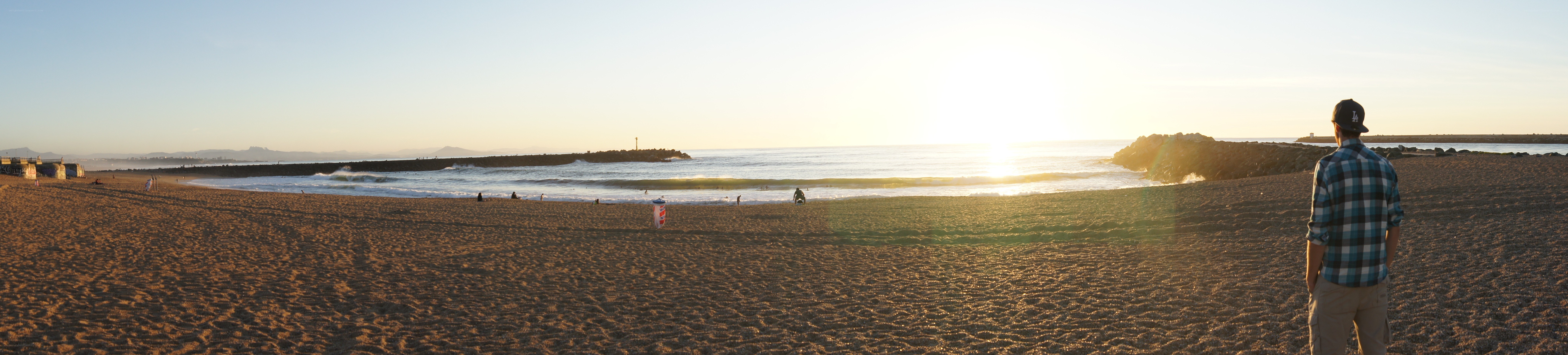 Man on beach at sunset