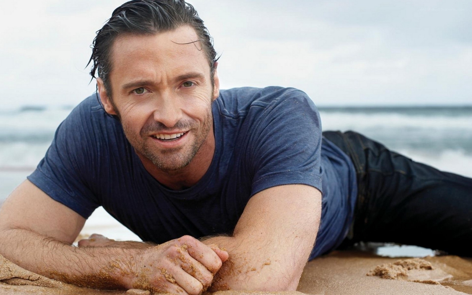 man on beach smiling