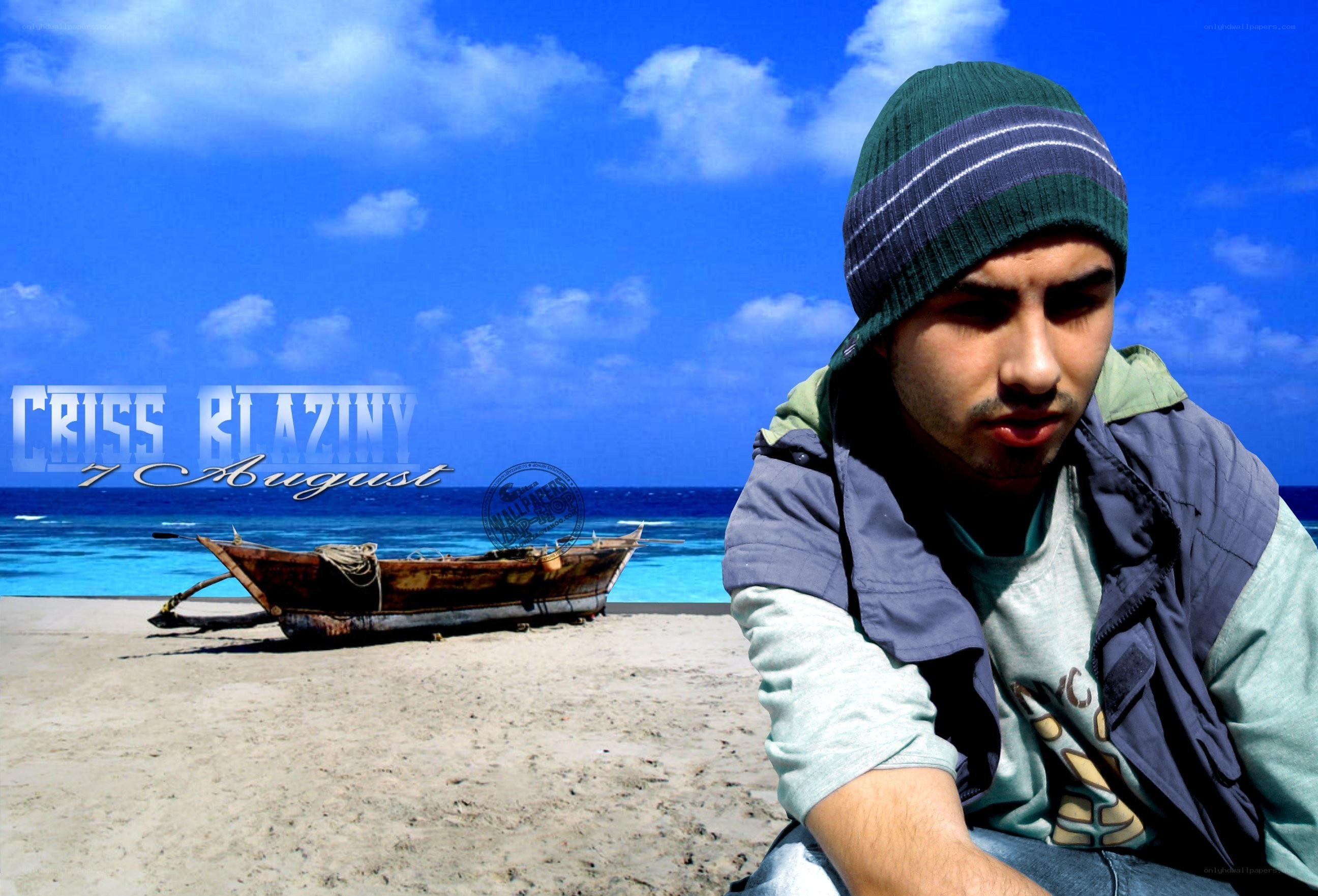 man on beach with boat