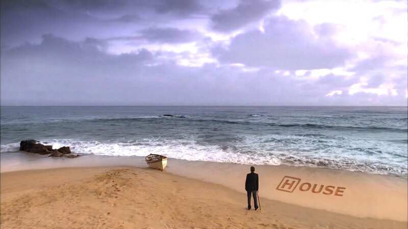 Man on beach with boat