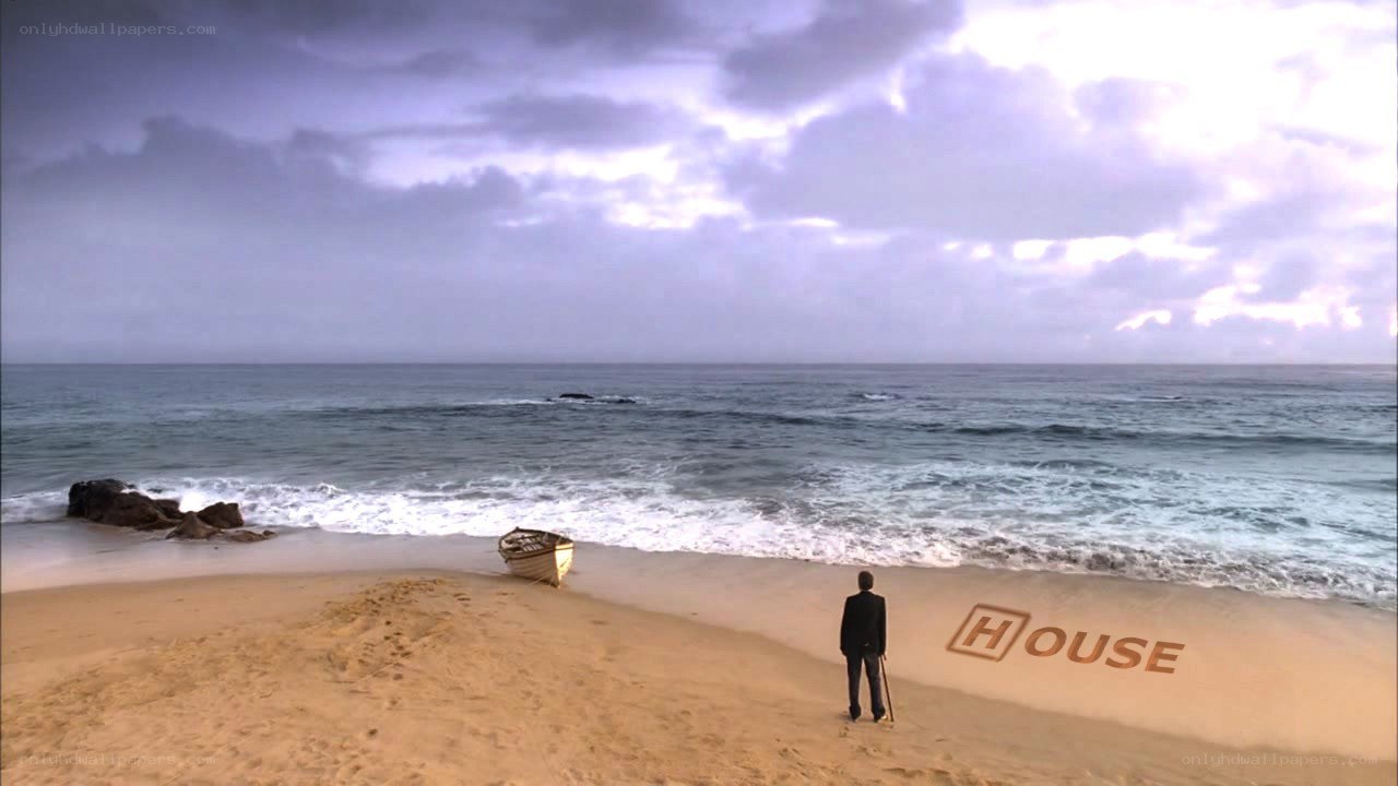 Man on beach with boat