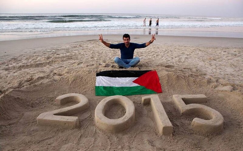 Man on Beach with Flag