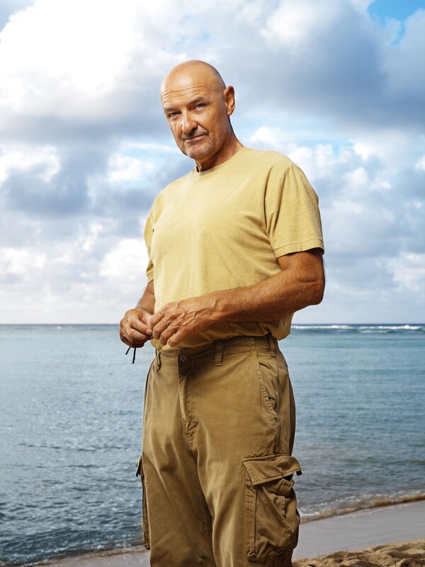 man on beach with ocean