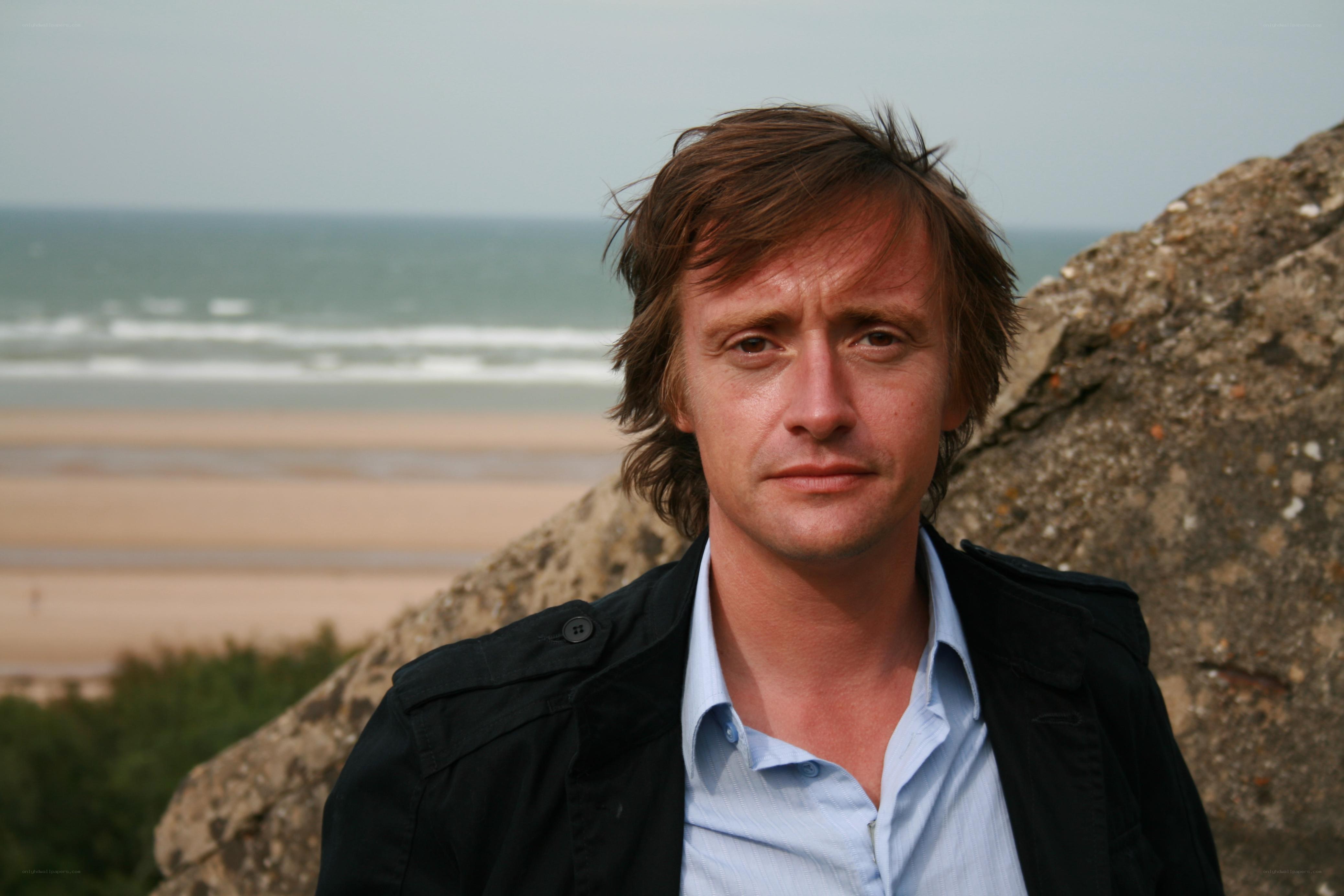 man on beach with ocean view