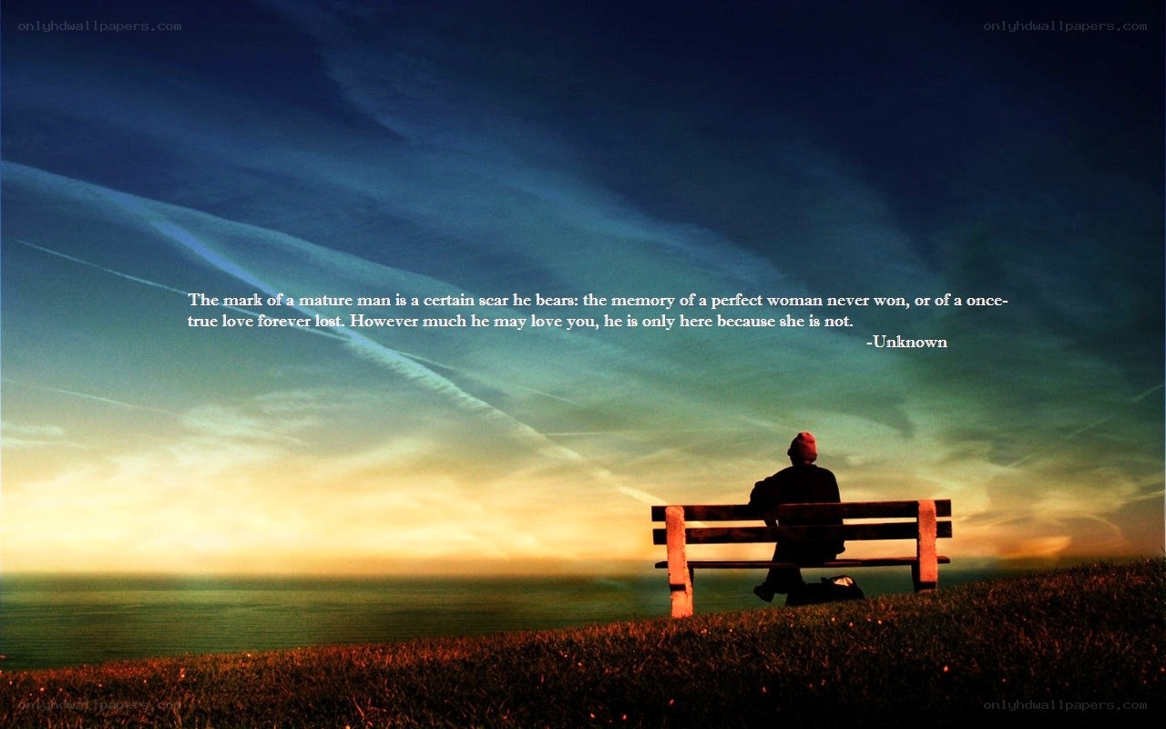 Man on bench at sunset
