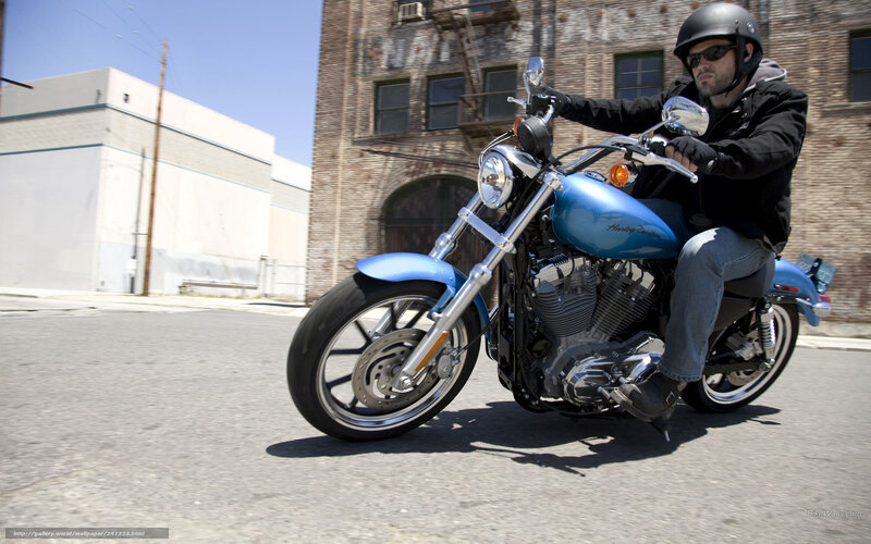 Man on Blue Motorcycle — Urban
