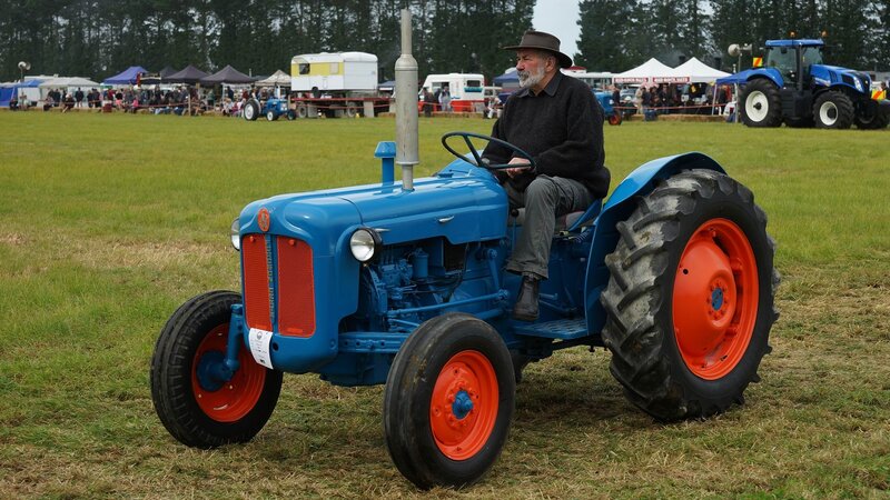 Man on Blue Tractor