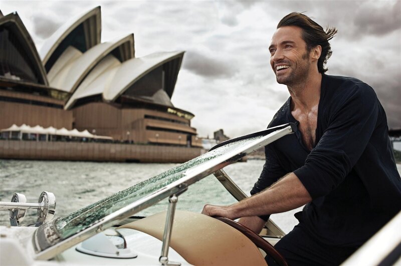 Man on boat near Sydney Opera House
