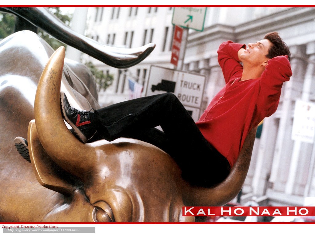 Man on bronze bull statue