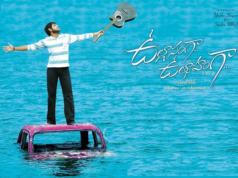 man on car in water with guitar