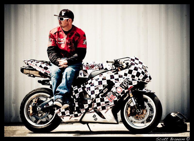 man on checkered motorcycle