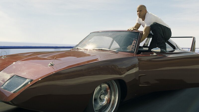 man on classic car