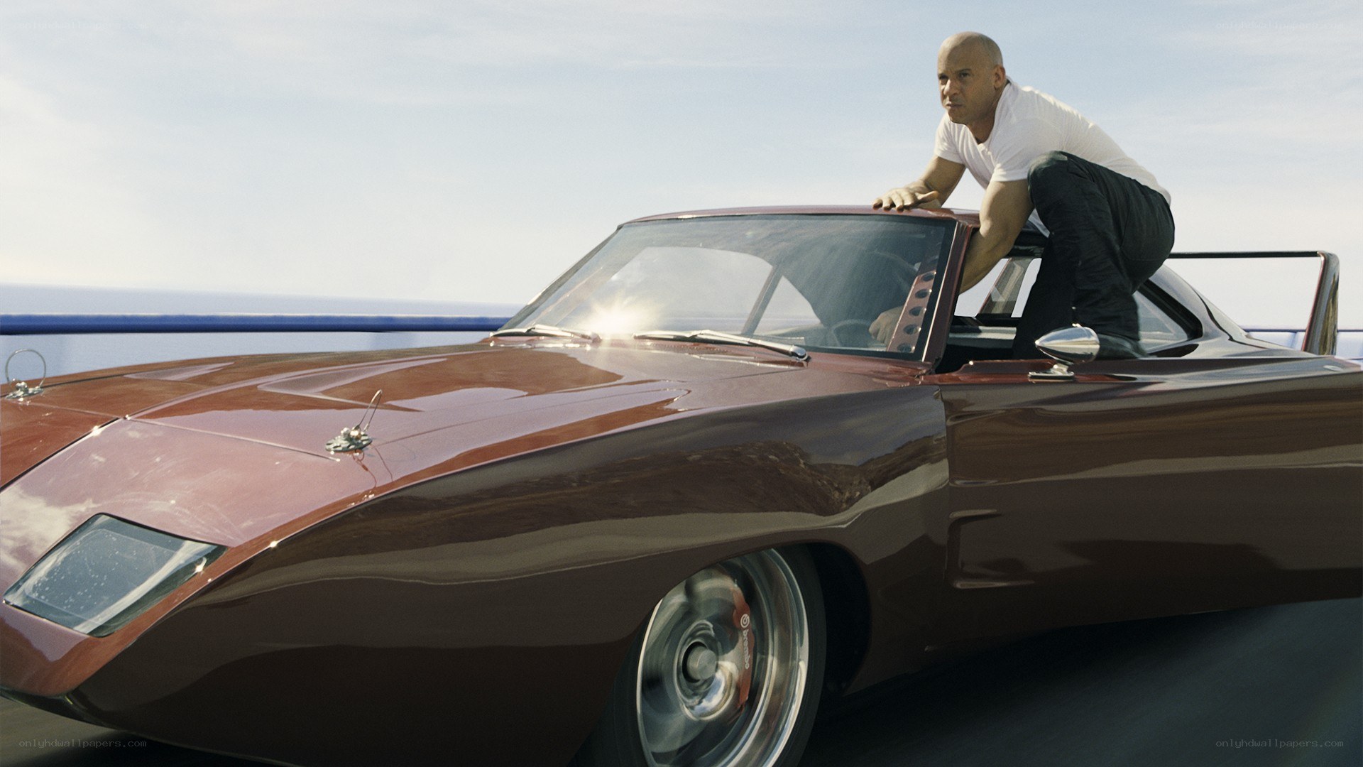 man on classic car
