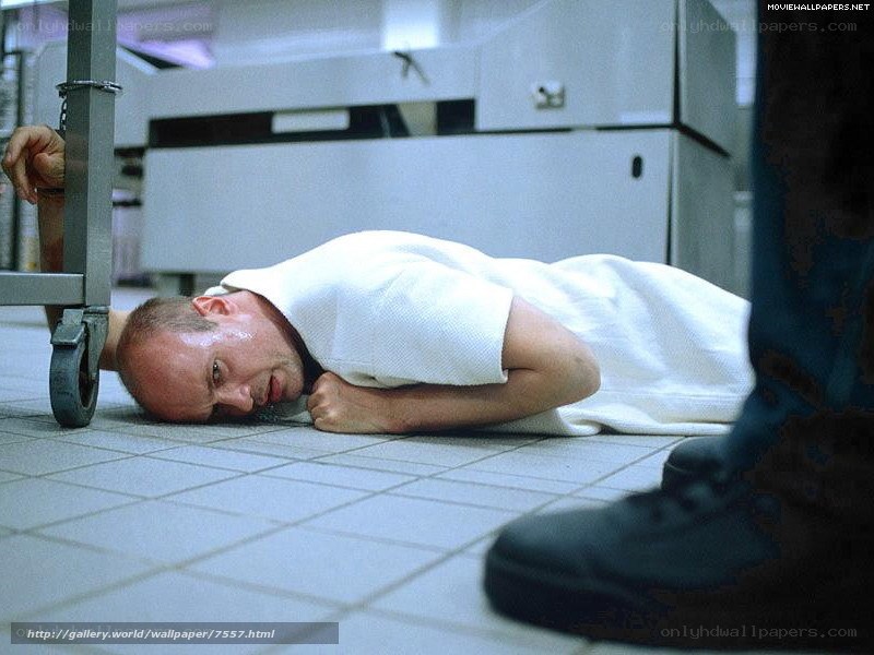 Man on floor in hospital scene