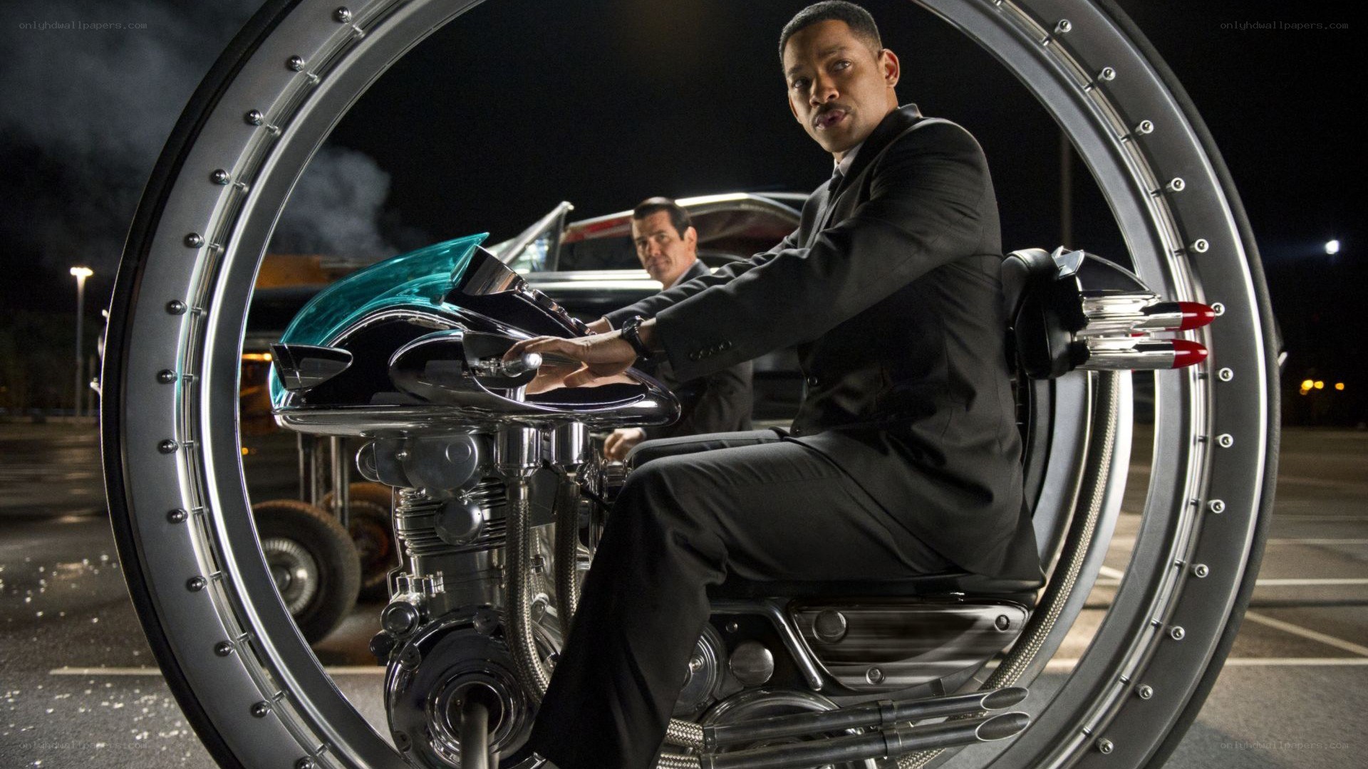 Man on futuristic motorcycle