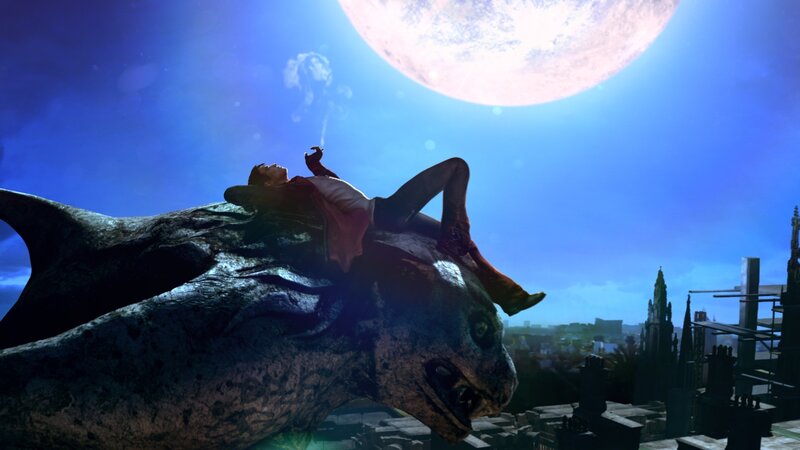 man on gargoyle under moon