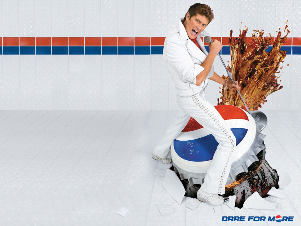 Man on giant soda bottle
