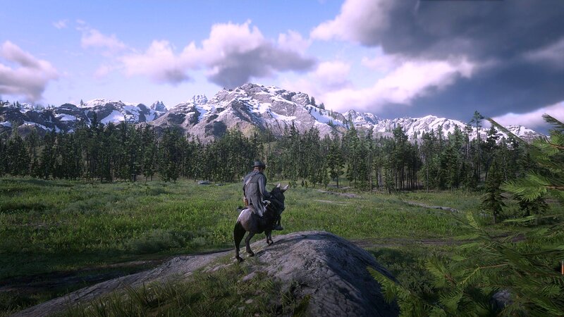 Man on Horse in Mountains