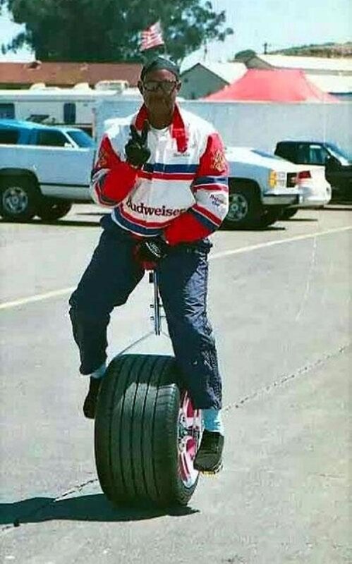 man on large wheel