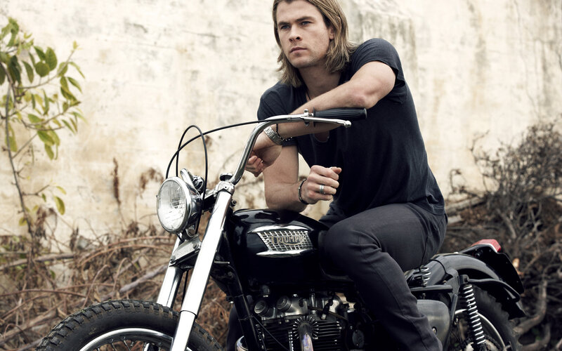 Man on Motorcycle — Black, Serious, Photograph