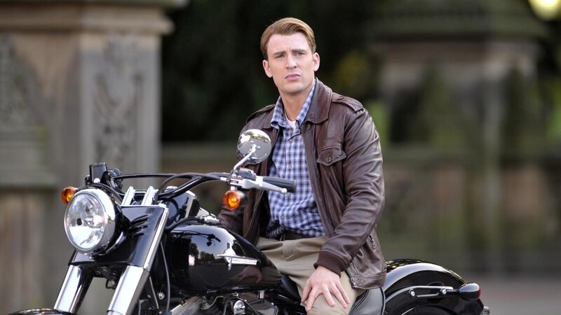 Man on Motorcycle — Brown, Serious, Afternoon