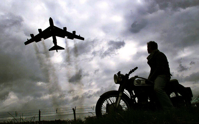 Man on Motorcycle — Gray, Dramatic, Photograph