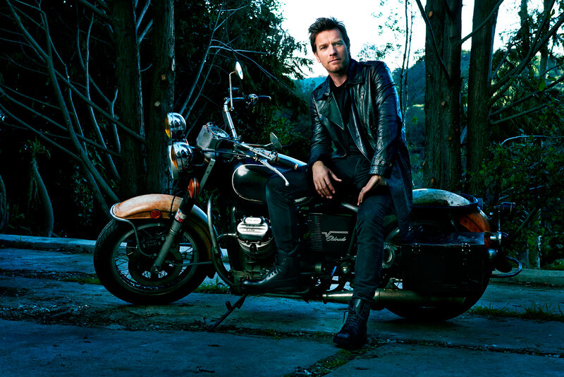 man on motorcycle in forest