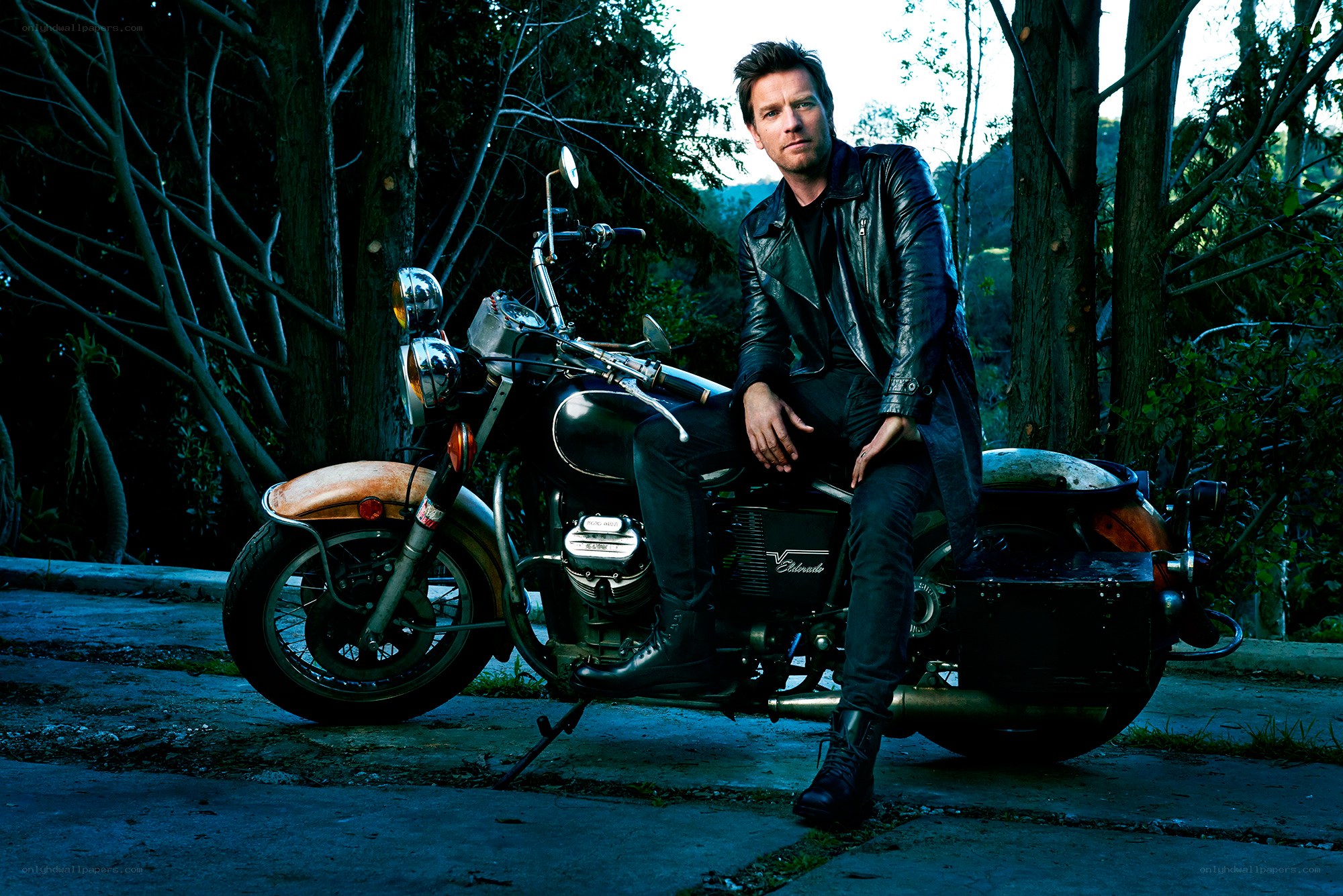 man on motorcycle in forest
