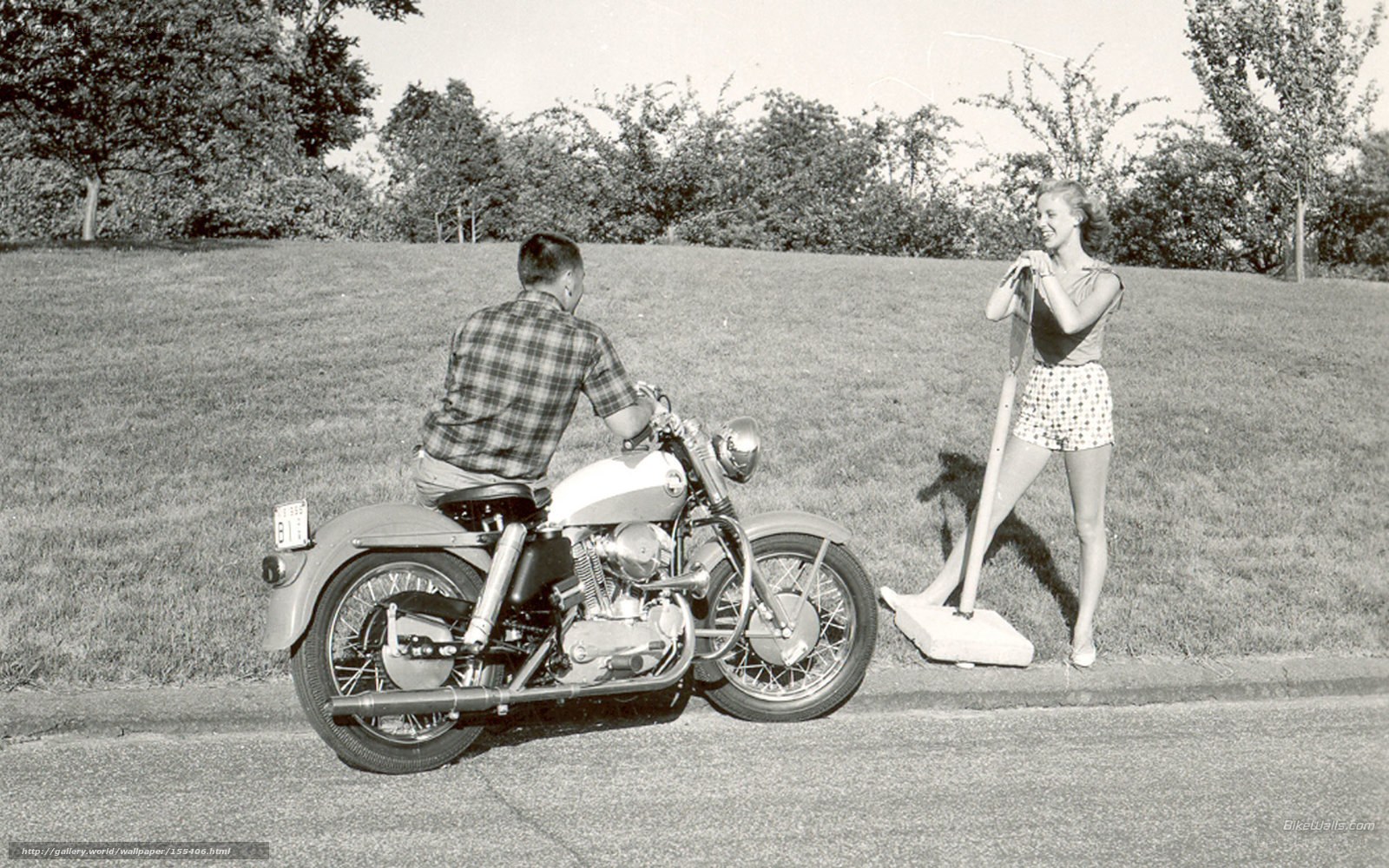 Man on motorcycle with woman