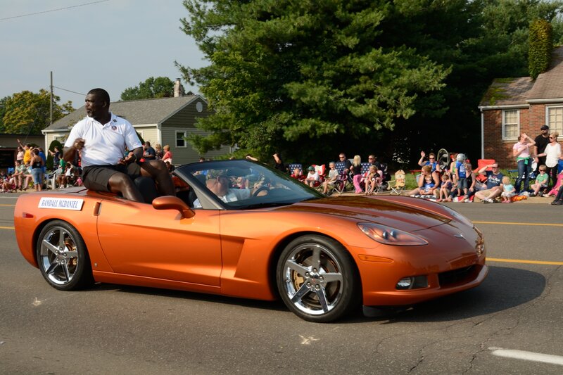 Man on Orange Car