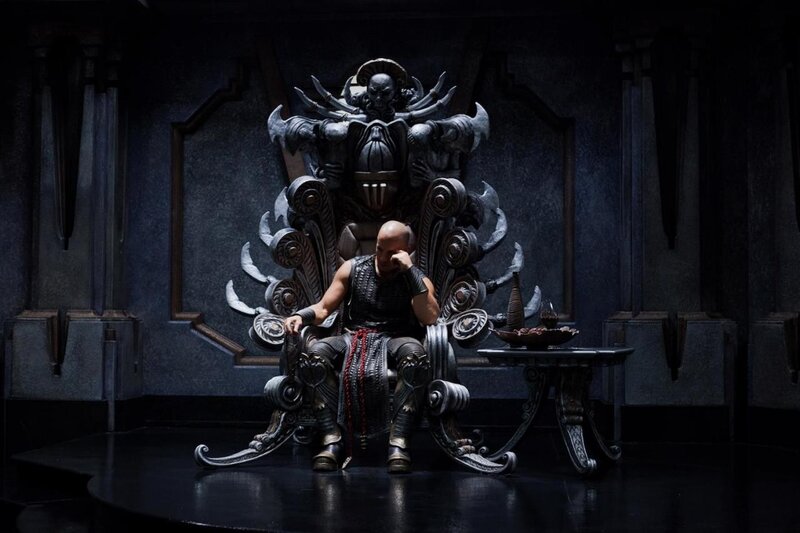 man on ornate throne