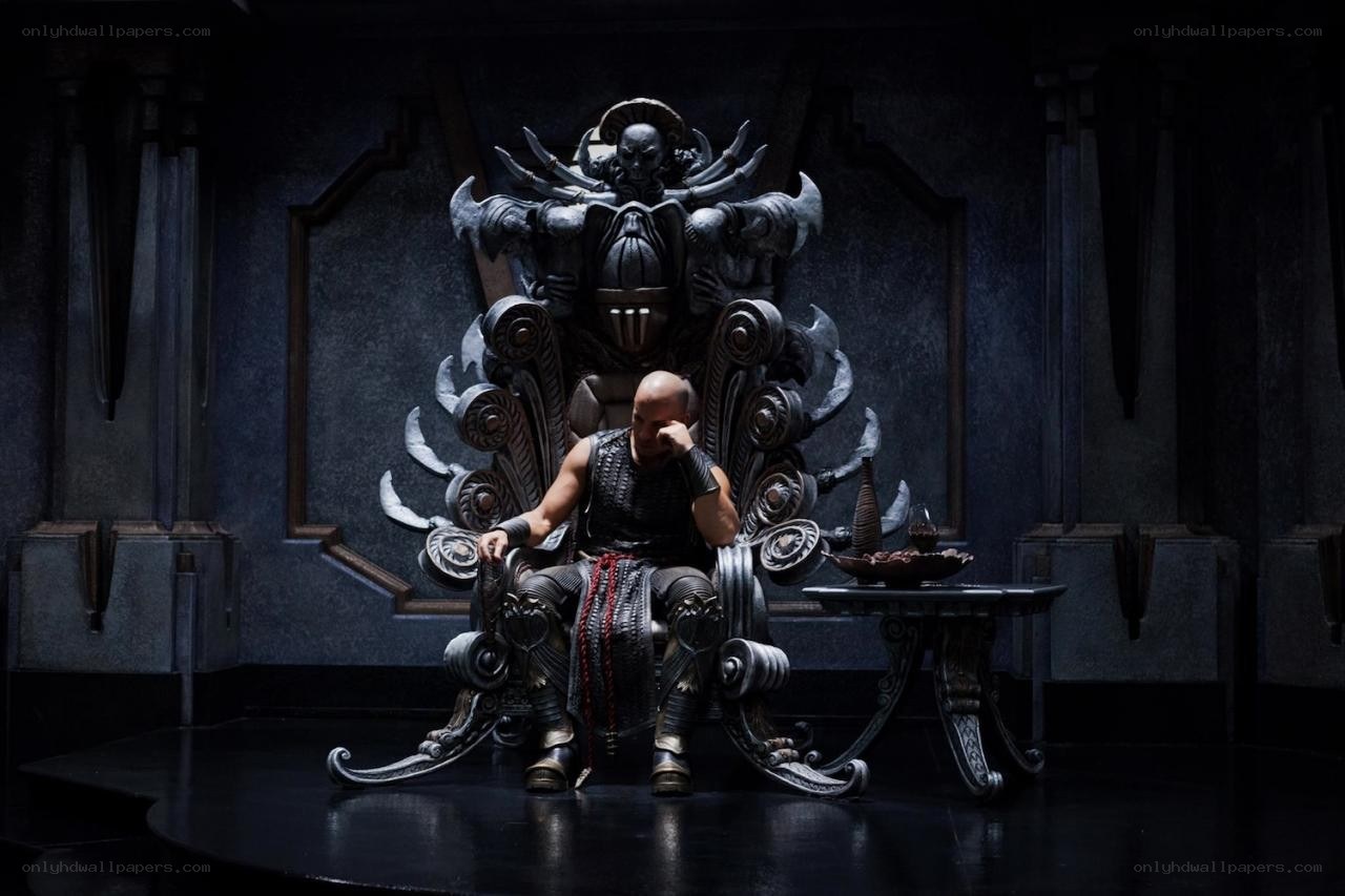man on ornate throne