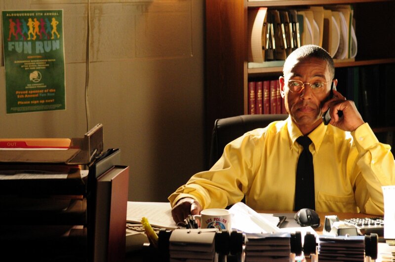 Man on phone at office desk