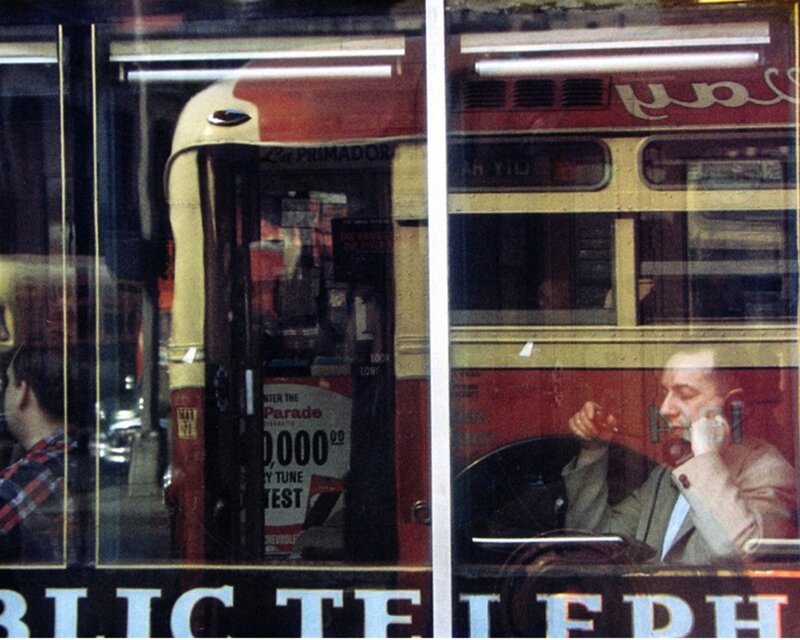 Man on Phone in Bus
