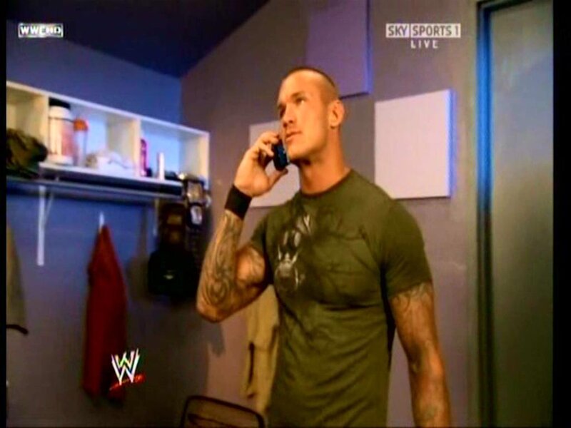 man on phone in locker room