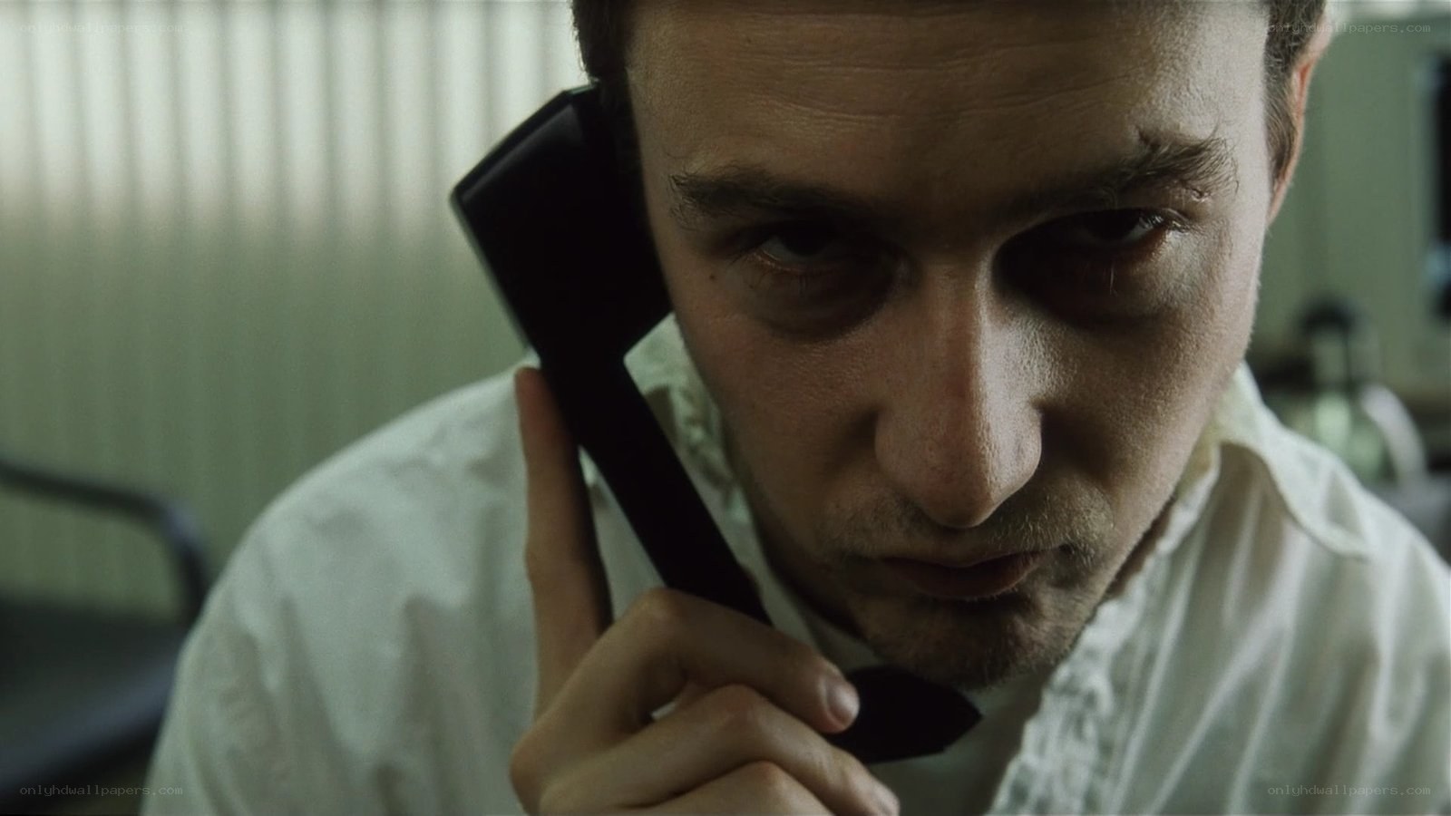 man on phone in office