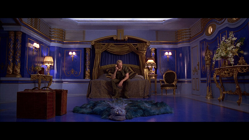 man on phone in ornate room