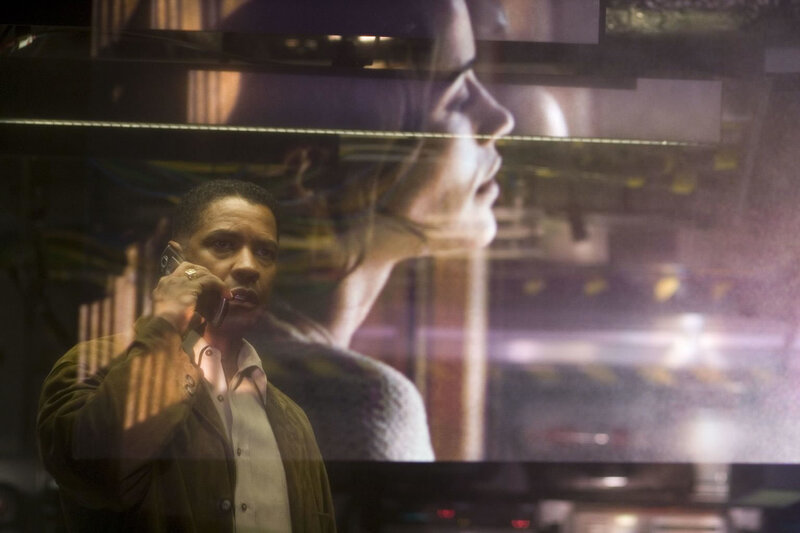 Man on Phone in Reflection